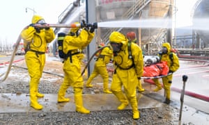 Fire fighters take part in an emergency drill against winter chemical hazards and accidents in Wuhai, north China’s Inner Mongolia Autonomous Region, 25 November, 2020.