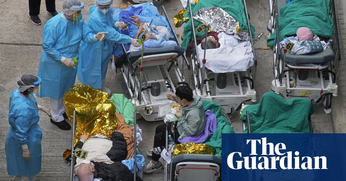 Hong Kong to allow in doctors from mainland China as Covid cases overwhelm hospitals