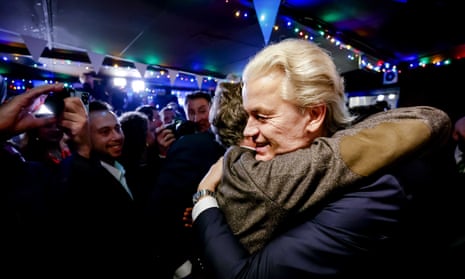 PVV leader Geert Wilders (R) is hugged as he responds to the results of the House of Representatives elections in Scheveningen, Netherlands, 22 November 2023.