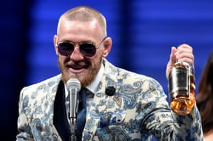 Conor McGregor, whiskey in hand, is all smiles despite his defeat and says he would be open to a return to the boxing ring in the future.