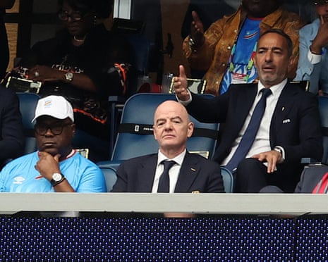 Democratic Republic of the Congo president Félix Tshisekedi, Gianni Infantino and Youri Djorkaeff watch DR Congo v Portugal in Houston.