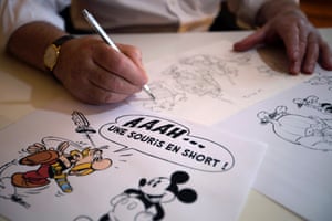 Illustrator Uderzo and author René Goscinny launched the Asterix comic strip in 1959. Uderzo is seen here working in his office in Neuilly-sur-Seine, in 2012.