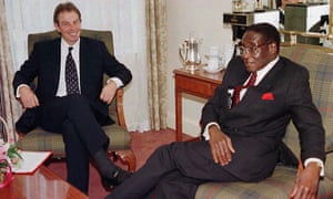 Tony Blair led the call to suspend Zimbabwe from the Commonwealth in 2002. Robert Mugabe, right, never forgave him.
