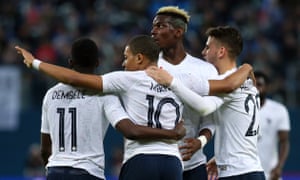 France players celebrate during their win in St Petersburg, where some fans targeted them with monkey chants.