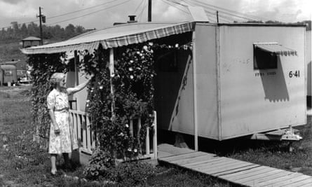 Trailer with decorative trellis, Oak Ridge, 1944. Residents of the Manhattan Project sites worked hard to make their dwellings as attractive and pleasant as possible, even when those dwellings were crude, government-issued trailers. Note the identifying numbers stamped and written on the side of the trailer.