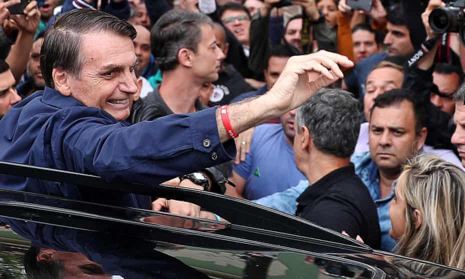 Jair Bolsonaro presidential candidate of the Social Liberal party (PSL), gestures after casting his vote in Rio de Janeiro