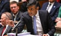 Rishi Sunak pointing right hand forward during prime ministers questions