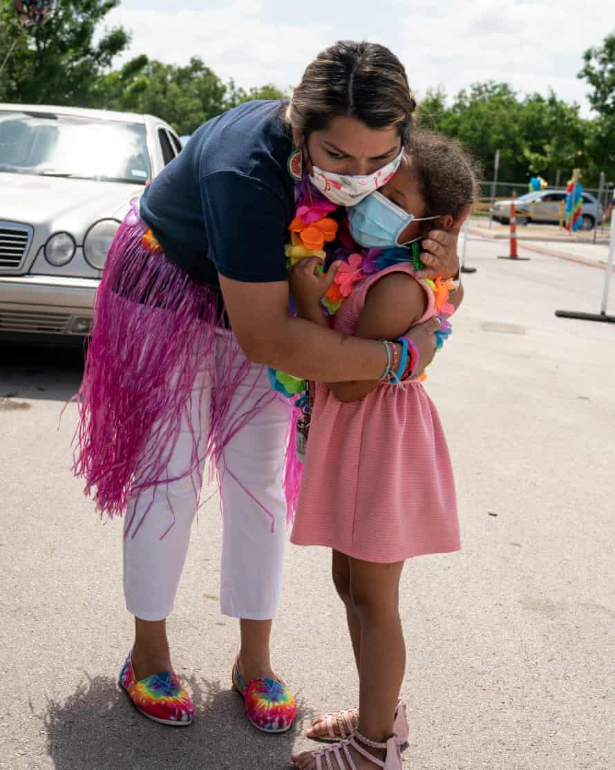 Jessica Cruz hugs her student goodbye on the last day of school.