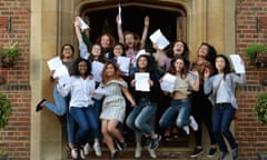 A-level students celebrate their results at King Edward VI high school for girls in Birmingham. 