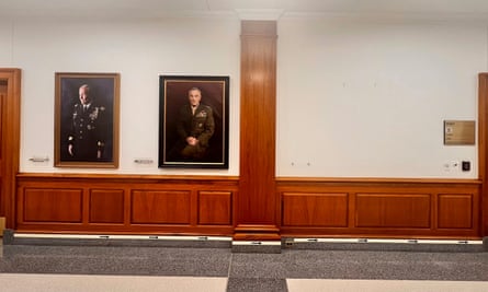 The space where a portrait of retired Gen Mark Milley once hung is empty at the Pentagon on Monday.