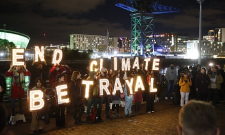 Activists urge negotiators to ‘End Climate Betrayal’ with concrete action over the next two weeks.