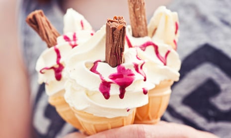 Ice-cream cones with raspberry sauce and chocolate