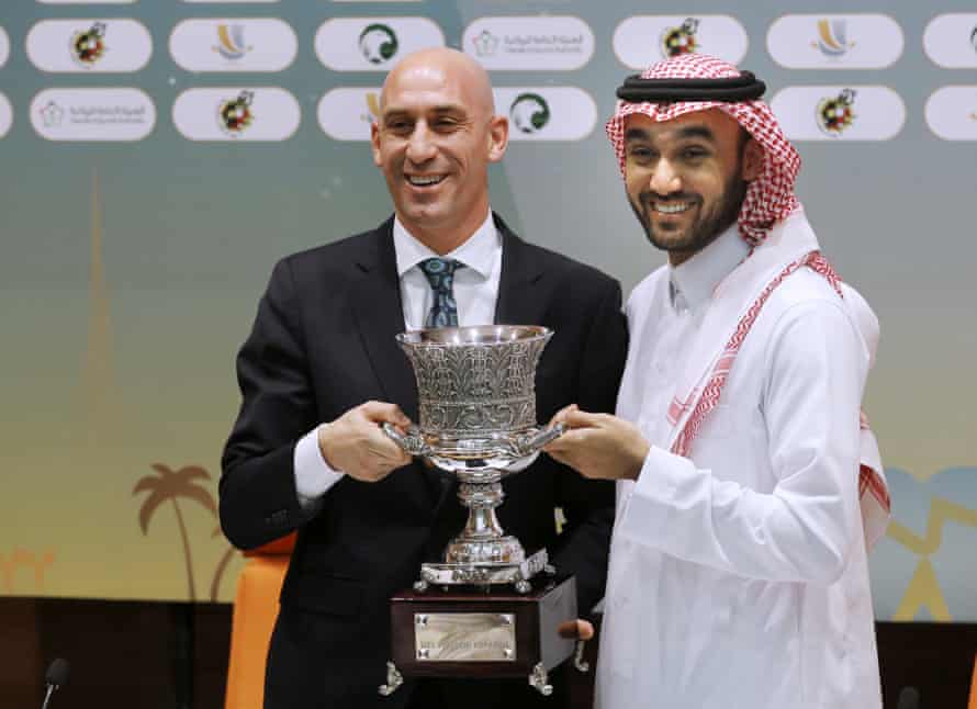 Luis Rubiales, left, and Saudi General Sport Authority chairman Prince Abdulaziz bin Turki Al-Faisal carry the Spanish football Super Cup during a press conference in 2019.