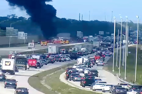 Plume of black smoke rose into the air as the aircraft collided with traffic on Interstate 75 in south-west Florida.