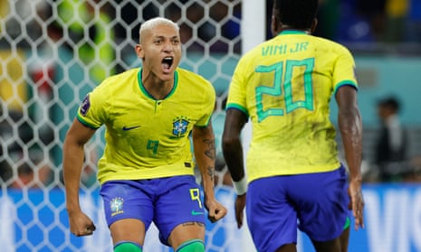 Brazil's Richarlison (left) celebrates with Vinicius Junior after teammate Lucas Paqueta scores their fourth goal.