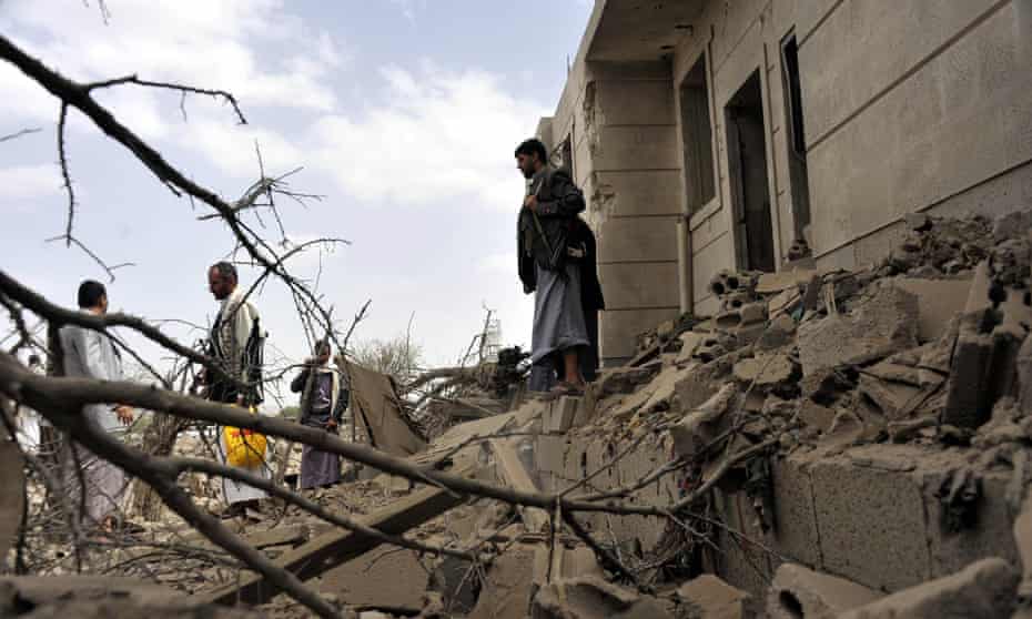 Yemenis inspect destroyed houses after a Saudi-led air strike in al-Jiraf district in Sana’a.