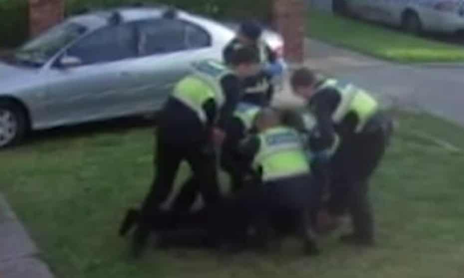 Security camera footage shows Victoria police officers pinning down a pensioner