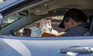 Due to the coronavirus pandemic, parishioners remained in their cars for the blessing.