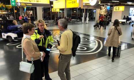 People inside the terminal of Amsterdam’s Schiphol airport. Police initially said they were investigating a ‘suspicious situation’.
