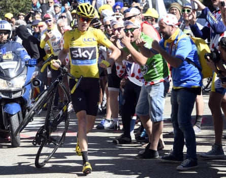 Chris Froome runs with his bike after he crashed during the ride up Mont Ventoux in 2016.