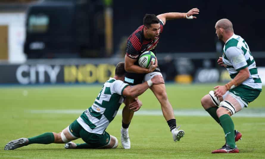 Sean Maitland of Saracens takes on the Ealing Trailfinders defence.