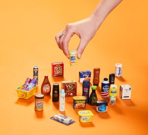 Huge hand picking up small boxes