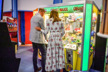 The Duke and Duchess of Cambridge play a crane grabber game at Island Leisure Amusement Arcade, Barry Island