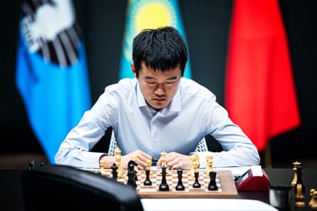 Ding Liren inspects the position during Sunday’s third rapid tiebreak game.