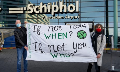 Extinction Rebellion activists protesting against climate pollution at Schiphol airport in the Netherlands. 