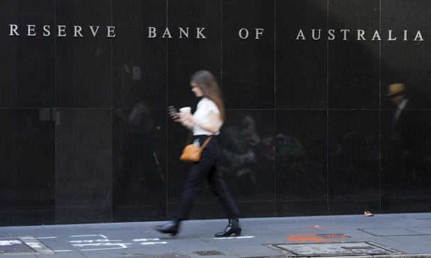 People walk past the outside of the Reserve Bank in Sydney