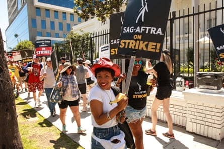 Actors and writers are marching on a picket line outside Netflix on July 20, 2023.