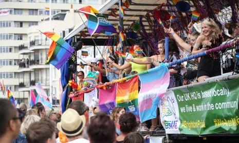 LGBTQ+ flags at Brighton Pride. A group of LGBT charities are challenging the Charity Commission’s charitable status grant to LGB Alliance in court.