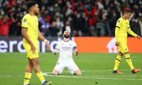 Karim Benzema of Real Madrid celebrates at the final whistle as Chelsea’s Reece James (left) and Thiago Silva look dejected.