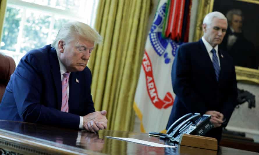 Trump and Pence, at prayer in the Oval Office.
