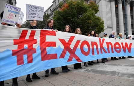 Climate activists protest on the first day of the Exxon Mobil trial outside the New York state supreme court in October 2019.