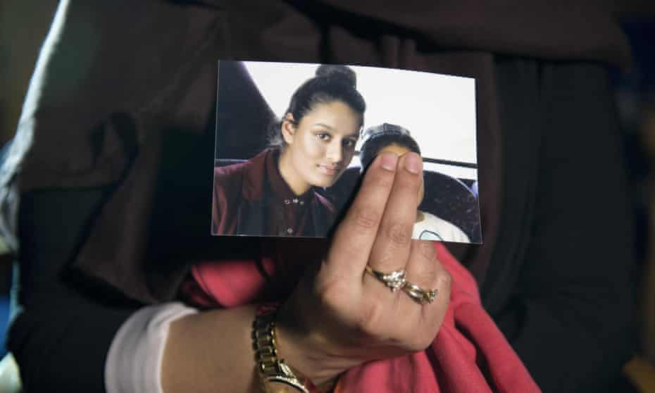 Renu Begum, eldest sister of Shamima, holds a picture of her sister.