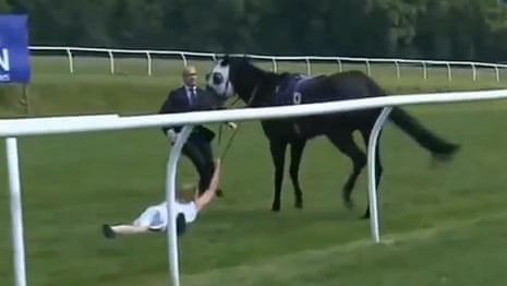 TV presenter tackles runaway racehorse at Chepstow – video