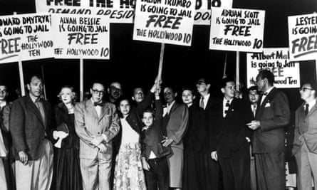 The Hollywood Ten stage a demonstration at Los Angeles airport on their way to prison.