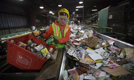 Sorting paper and plastic waste in Oregon, US