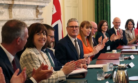 Keir Starmer chairs his debut cabinet meeting during his first full day as prime minister.