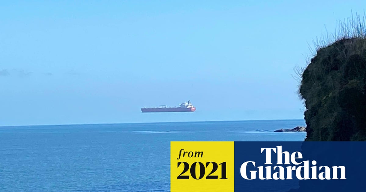 Walker 'stunned' to see ship hovering high above sea off Cornwall