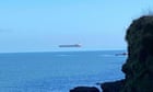 Walker 'stunned' to see ship hovering high above sea off Cornwall