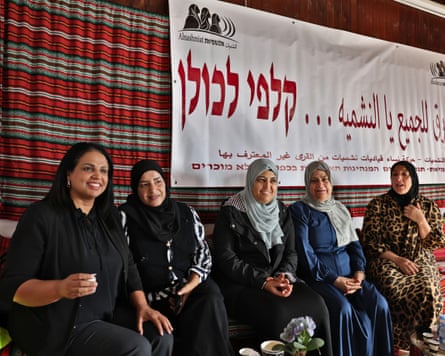Women sitting in a line