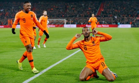 Gini Wijnaldum celebrates after opening the scoring in the closing minutes of the first half.