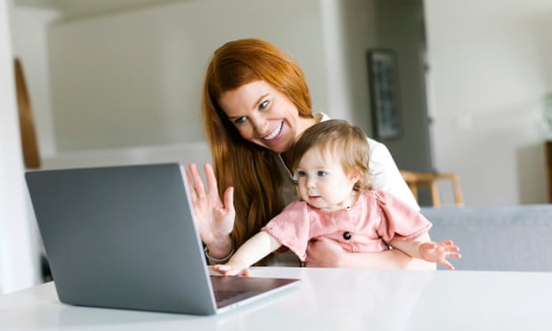 Mother and daughter using laptop to video chat (posed by models)