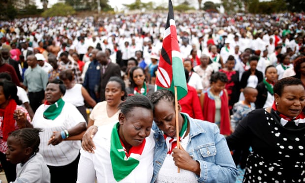 Kenyans pray during a rally in Nairobi calling for peace ahead of the 8 August election.