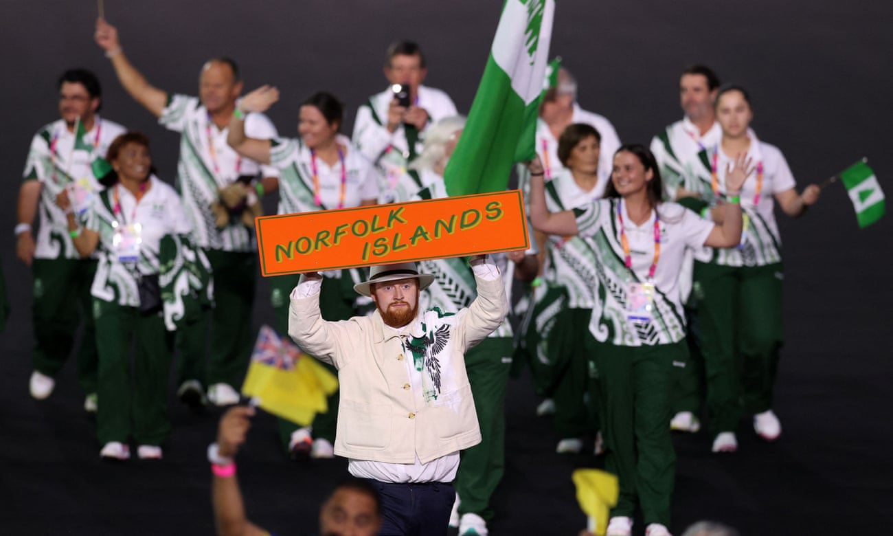 The Norfolk Island team march in Alexander Stadium in Birmingham at the 2022 Commonwealth Games opening ceremony.