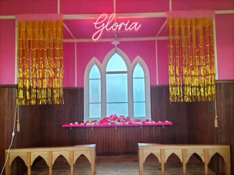 An illuminated Gloria sign