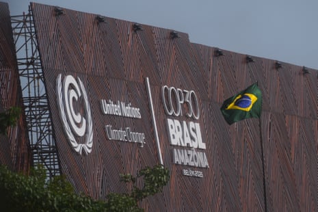 A Brazilian flag flies outside the venue for the Cop30 summit in Belém, Brazil.