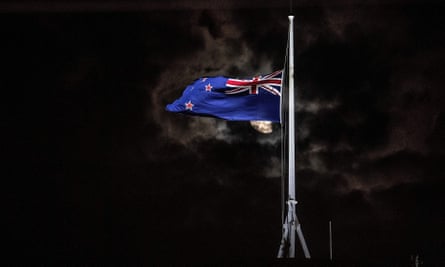 The New Zealand national flag is flown at half-mast on a parliament building in Wellington.